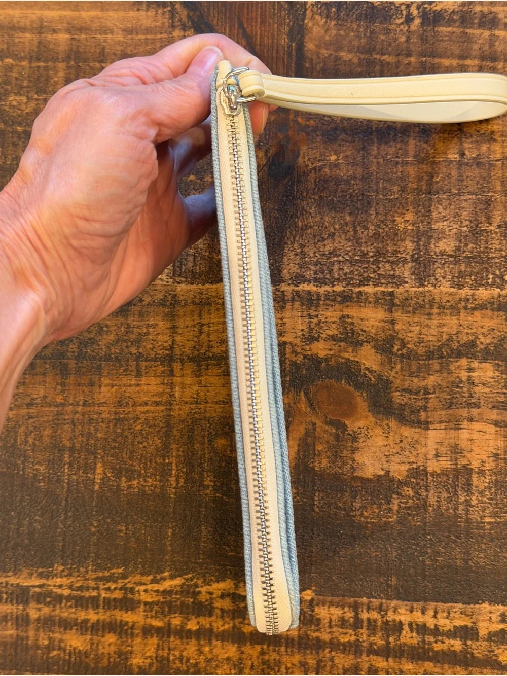 kate spade light denim wristlet with cream strap